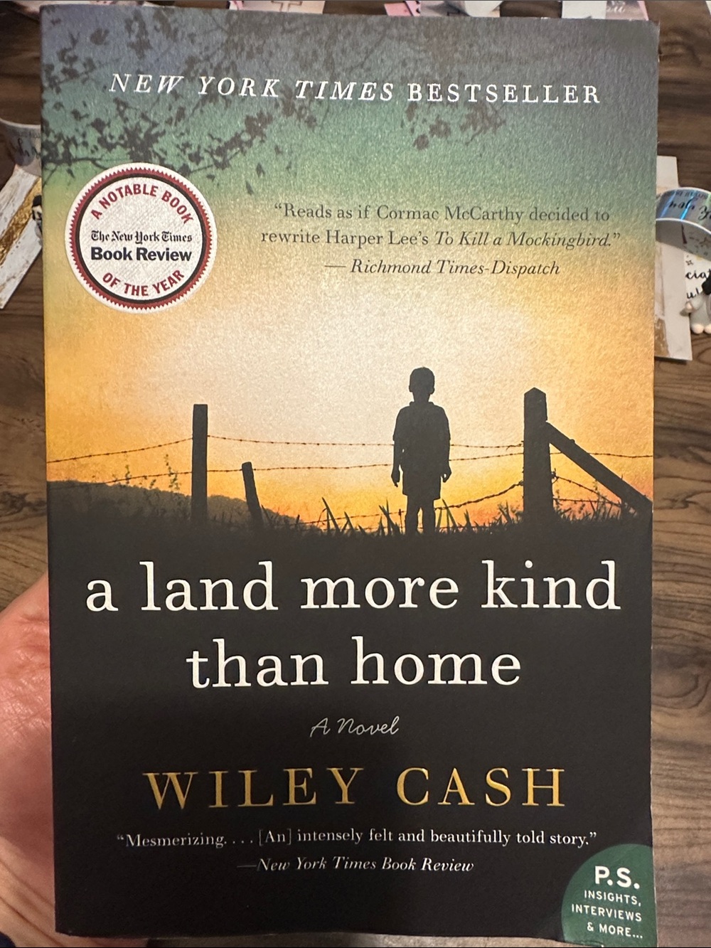 A Land More Kind Than Home by Wiley Cash - Sunset Silhouette Cover